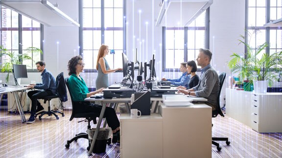 employees working infront of computer